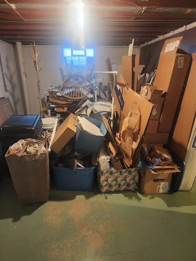 Roll-off dumpster container at job site for Yard Waste Dumpster Rental in Harwood Heights